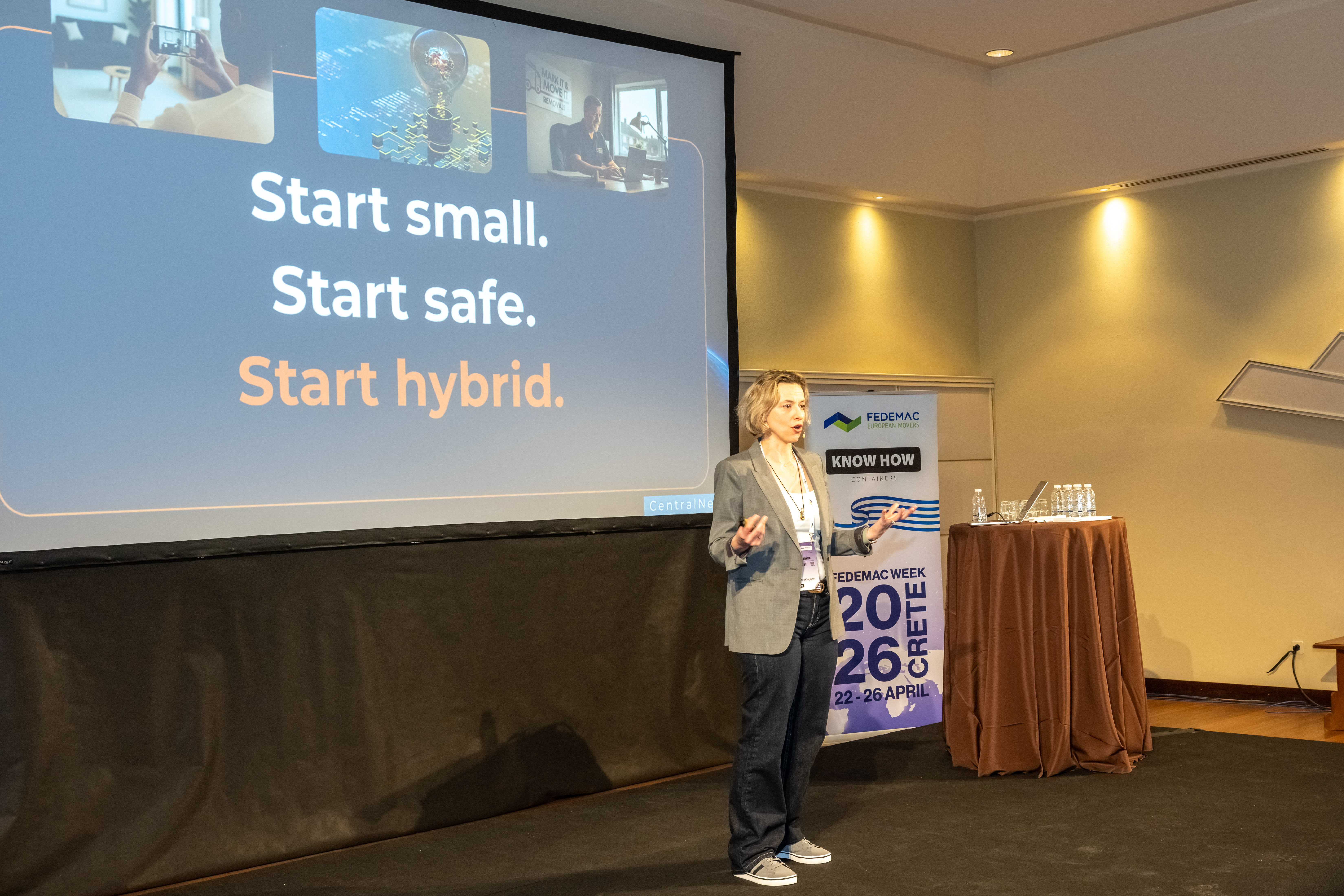 Victoria Papathanasiou presenting at FEDEMAC Week 2026 in Crete with Start Small Start Hybrid slide